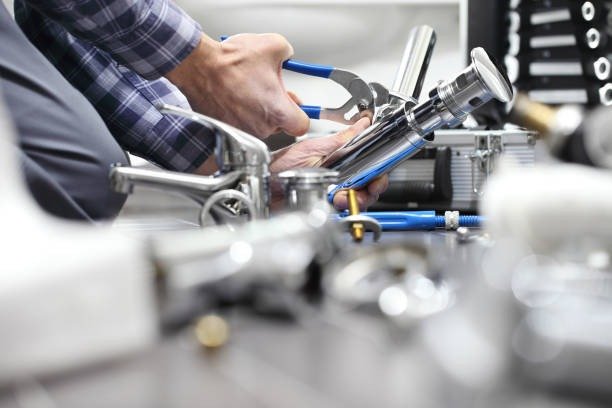 imgi_11_hands-plumber-at-work-in-a-bathroom-plumbing-repair-service-assemble-and-install-concept